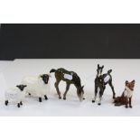 Two Beswick foals, two Black Face Sheep and a seated Fox, again all Beswick