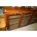 Victorian Walnut Display Cabinet with Two Arched Glazed Doors opening to reveal Two Adjustable