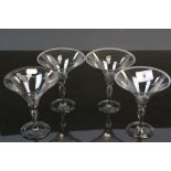 Four Champagne glasses, Scandanavian style with engraved Dancing Nude female figures