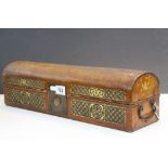 Oriental Leather covered dome topped oblong box with Gilt highlighted embossed decoration and a