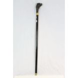 Ebonised walking stick with Brass banding and a large Dogs head finial