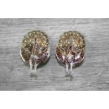 Pair of Silver Clip On Earrings in the form of Peacocks