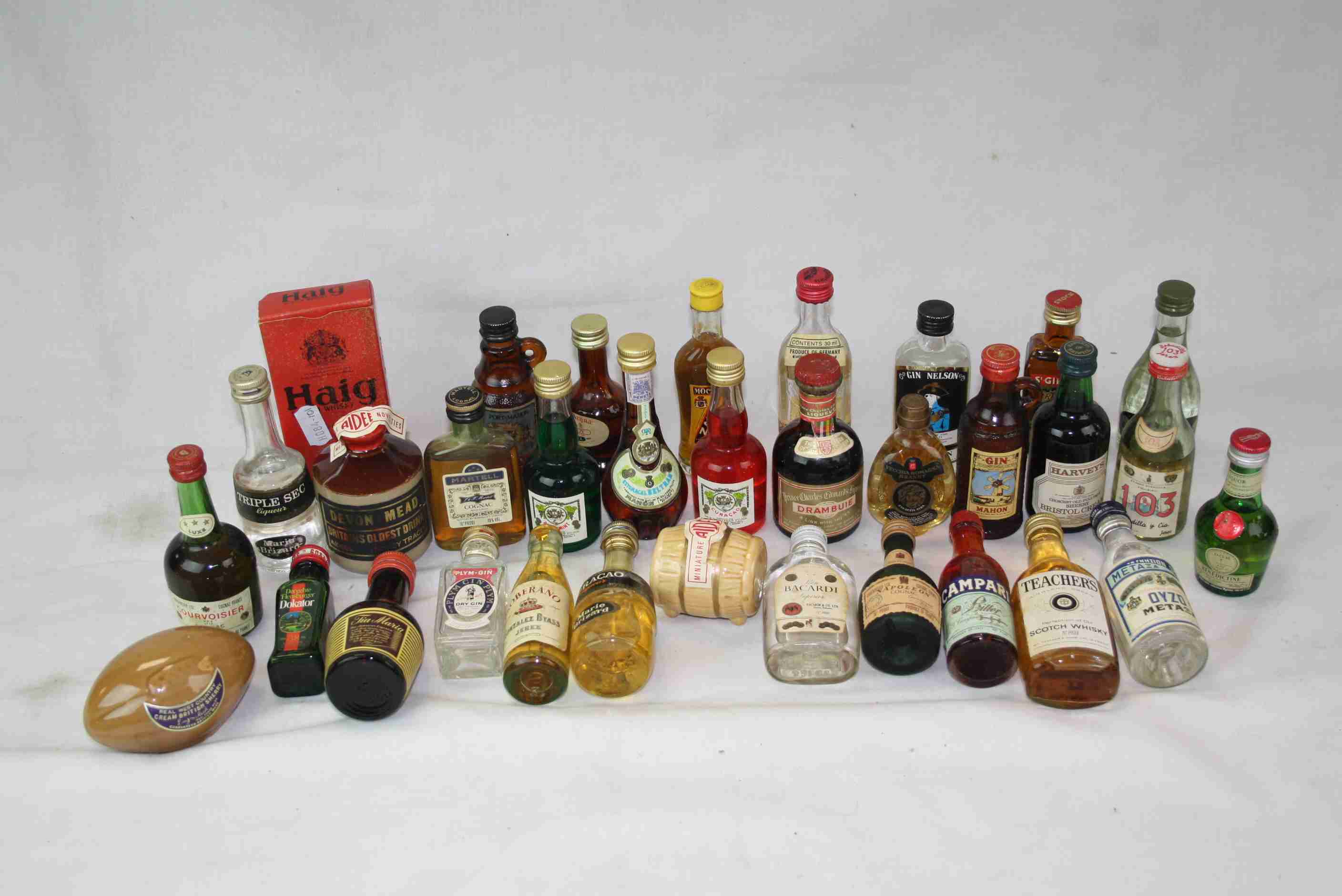 Box of vintage Miniature bottles of Alcohol to include Brandy, Gin & Whisky etc