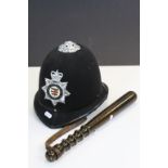 Avon and Somerset constabulary police helmet with a wooden truncheon