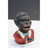 Painted Cast Iron Money box in the form of a Native African figure