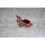 A Brass pincushion in the form of a Rabbit