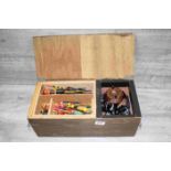 Fishing tackle box with contents to include many items featuring reels, floats, line etc