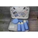 Vintage Picnic type hamper in a Suitcase style case, includes Thermos Flasks and cutlery