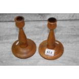 Pair of arts and crafts style Treen candlesticks