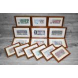 Fifteen framed & glazed vintage UK Banknotes in mostly Uncirculated condition to include;