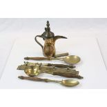 Brass kitchen utensils with wall mount together with a Persian brass hot water/coffee pot