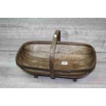 A vintage chestnut wood fruit trug