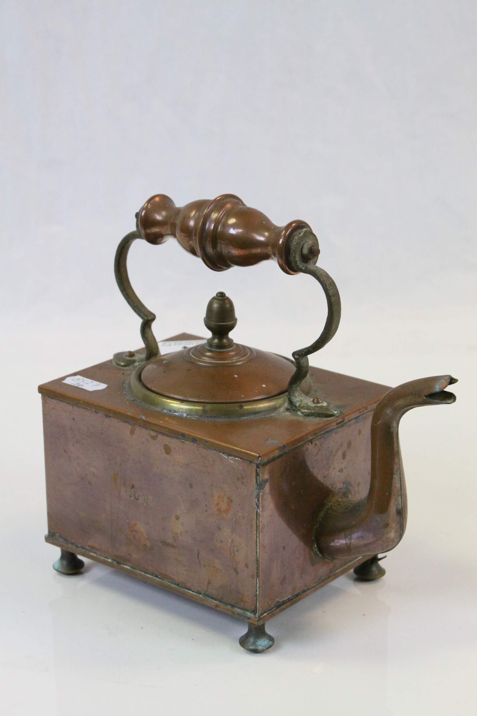 An antique 19th Century Copper and Brass kettle in square form mark to side VR