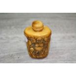 Oriental bone snuff bottle decorated with Buddha