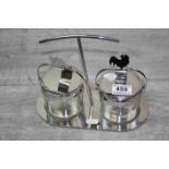 WMF "Chromagen" Condiment stand with pair of hinged lid Glass pots