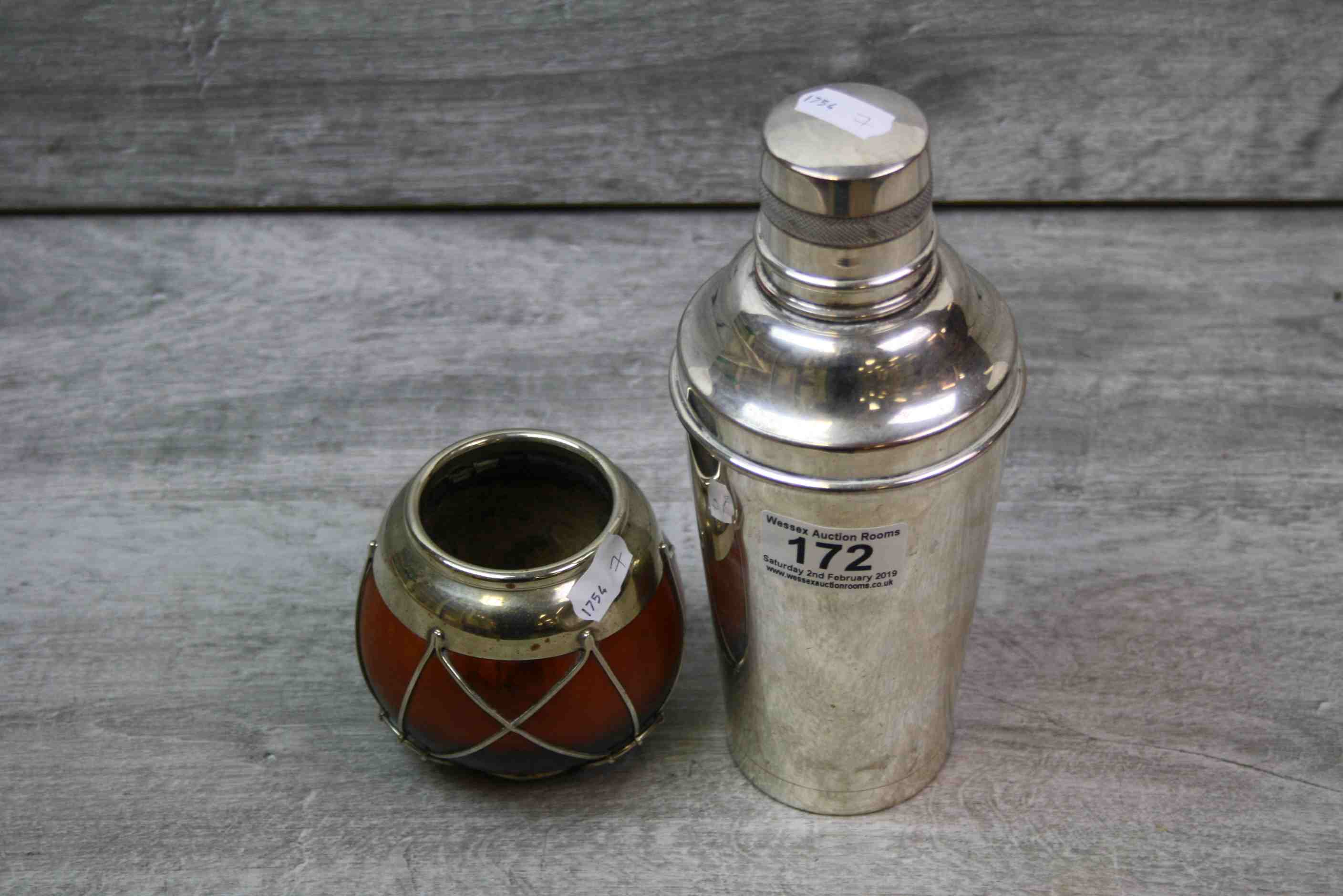 White metal cased coconut beaker, the coconut with white metal overlay, height approximately 9cm