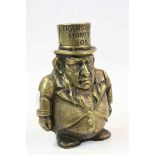 Transvaal brass money box modelled as rotund man with top hat, height approximately 15cm