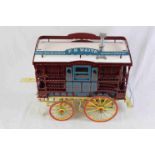 Hand made kit built wooden tradesman's wagon in dark red and yellow livery with blue and bright