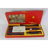 Boxed Triang OO gauge RS34 train set complete with locomotive, rolling stock, track and