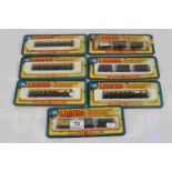 Seven carded (all previously opened) Grafar N gauge items of rolling stock featuring 4 x coaches and