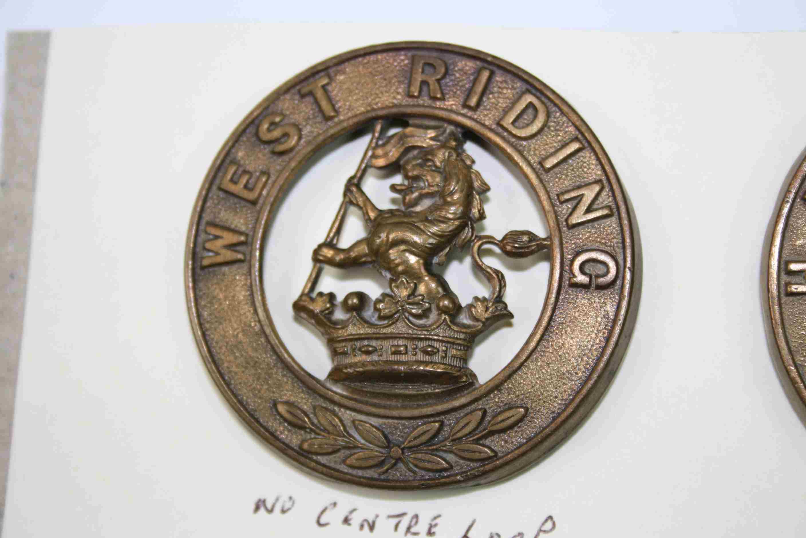 Two Brass Helmet Plate Badges For The West Riding And The Hampshire Regiment. - Image 3 of 4