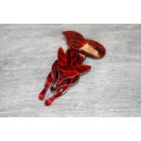 Lea Stein style celluloid brooch modelled as a fox, red and black colourway with geometric