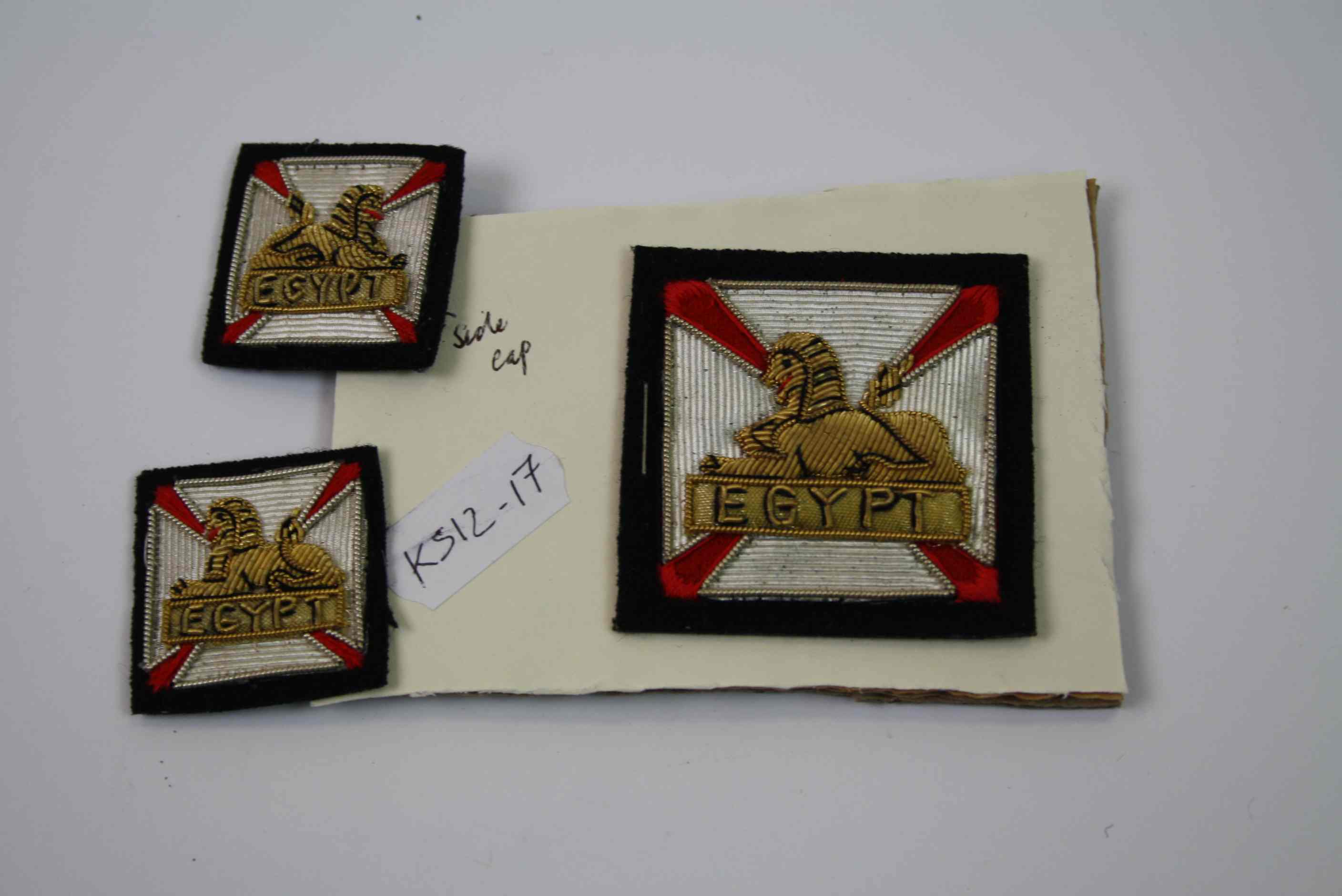 A Gloucestershire Regiment Side Cap Cloth Badge Together With Two Mess Collar Badges. - Image 2 of 5