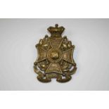 A Cumberland 34th Regiment Of Foot Glengarry Badge. The Design For This Brass Badge Is Similar To
