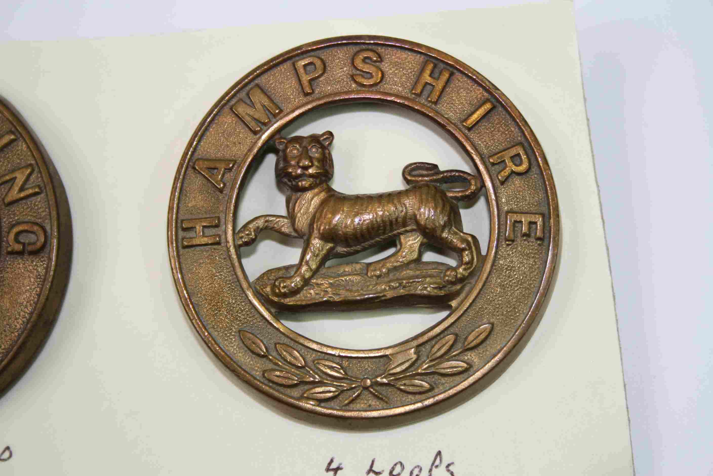 Two Brass Helmet Plate Badges For The West Riding And The Hampshire Regiment. - Image 4 of 4