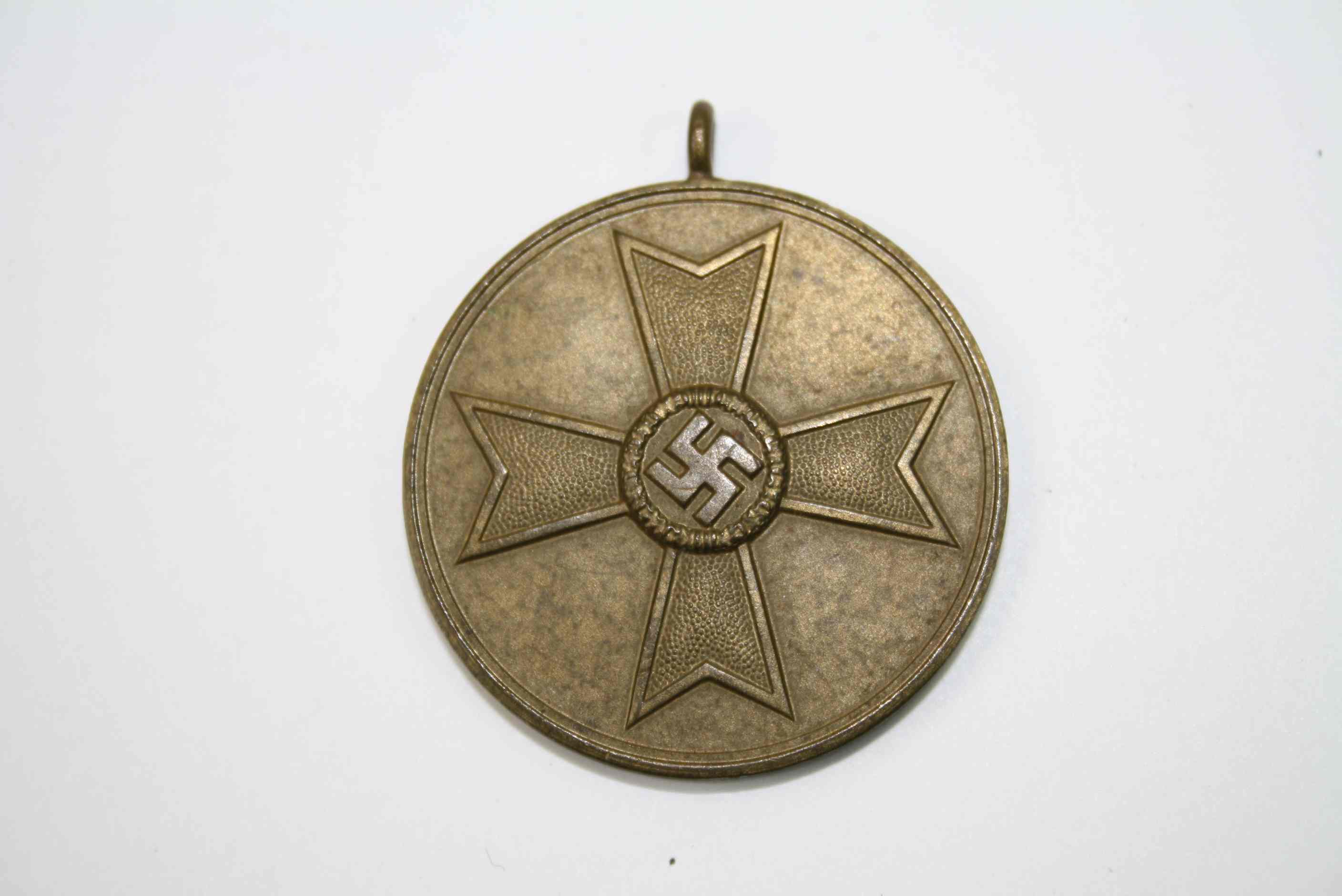 A German World War Two / WW2 1939 KVK War Merit Medal