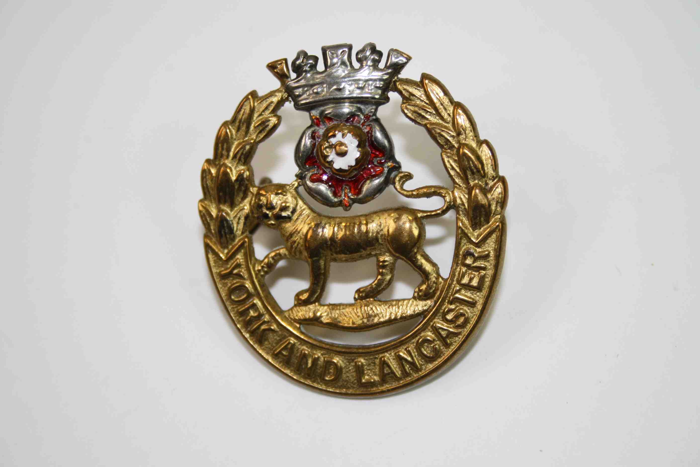 A York And Lancaster Regiment Officer's Cap Badge. Die-cast gilt Metal With Applied Silvered Coronet