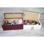 Two shoe boxes of mixed costume jewellery to include bangles, necklaces, earrings etc