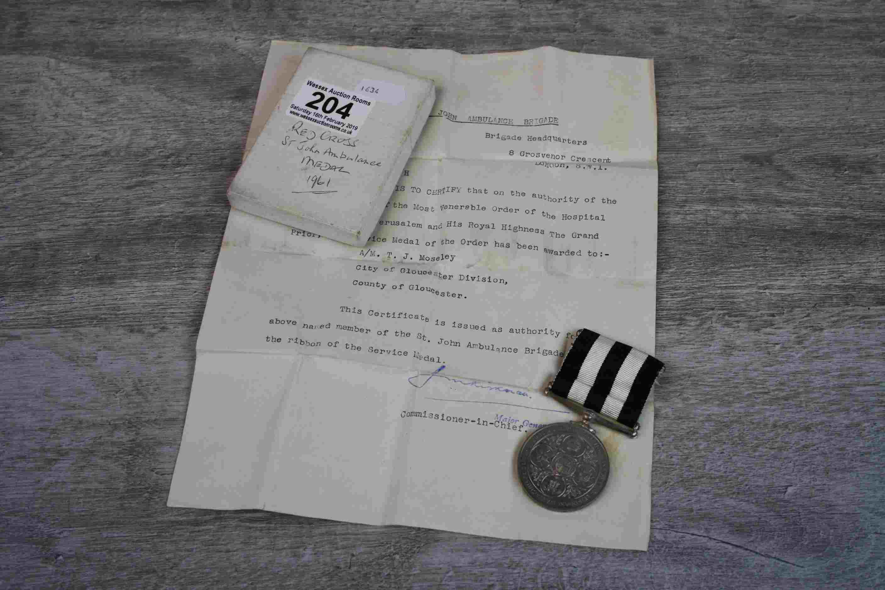 Order of St John Long Service medallion, to T. J. Moseley S.J.A.B. Glos. 1961 with issue paperwork - Image 2 of 5