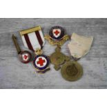 Collection of British Red Cross Badges and Medals, one engraved with Nurses name and a World War I