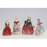 Four Royal Doulton ceramic figurines to include; "Veronica" HN1517, "Lady Charmian" HN1949, "