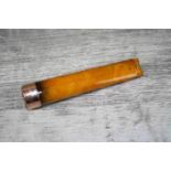 Edwardian rose gold collared amber style cheroot holder, hallmarked London 1908