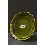 Linthorpe Pottery Green glazed Plate with wavy edge, pattern number 1898, approximately 8.75