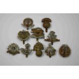 A Collection Of Ten British Military Regimental Cap Badges To Include : Middlesex Regiment, York And