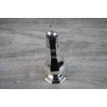 Edwardian silver sugar caster of octagonal baluster form, raised on moulded foot, makers Josiah