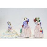 Three Royal Doulton figurines, "Miss Demure" HN1402, "Day Dreams" HN1731, "Blithe Morning" HN2021