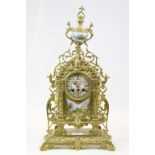 Ornate French Gilt Brass Mantle Clock, key wind with striking mechanism, the hand painted Enamel