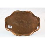 Arts & Crafts style oval Copper tray with wavy edge, Dolphin design and punch marked "Newlyn" to