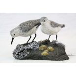 Mike Wood hand painted Wooden carving of a pair of "Little Stint's", dated 2003 and standing