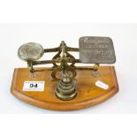 Vintage pair of Brass Postal Letter Rates Scales & Weights on a wooden base