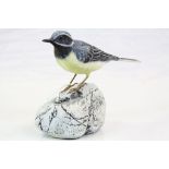 Carved, hand painted Wooden model of a "Grey Wagtail" by Mike Wood, stands approx 15cm tall