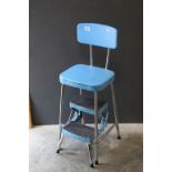 A 1950's metal folding kitchen stool with folding steps by Prestige