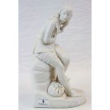 Large Parian Ware figurine of a seated Girl with shoes removed, marked to side with Victorian date