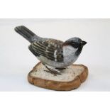 Mike Wood hand painted Wooden model of a Sparrow on a slice of bread, dated 2003 and standing approx