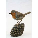 Mike Wood hand painted carved Wooden model of a Robin on a Pinecone, stands approx 14.5cm tall