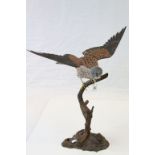 Large Mike Wood carved Wooden model of a Kestrel, dated 2004 and standing approx 52cm at the highest